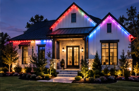 Permanent roofline lighting in red, white, and blue on a home
