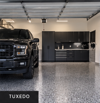 Epoxy garage floor coating in Tuxedo flake — two-car garage in Montgomery County, TX