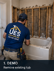 Tub to shower conversion step 1: UES Solutions crew removing the existing bathtub