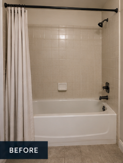 Before a tub to shower conversion: builder-grade bathtub with shower curtain and tile surround